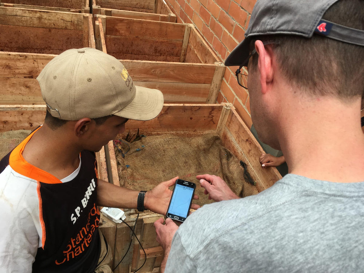 William shows Tom tracking data from the fermentation data loggers.